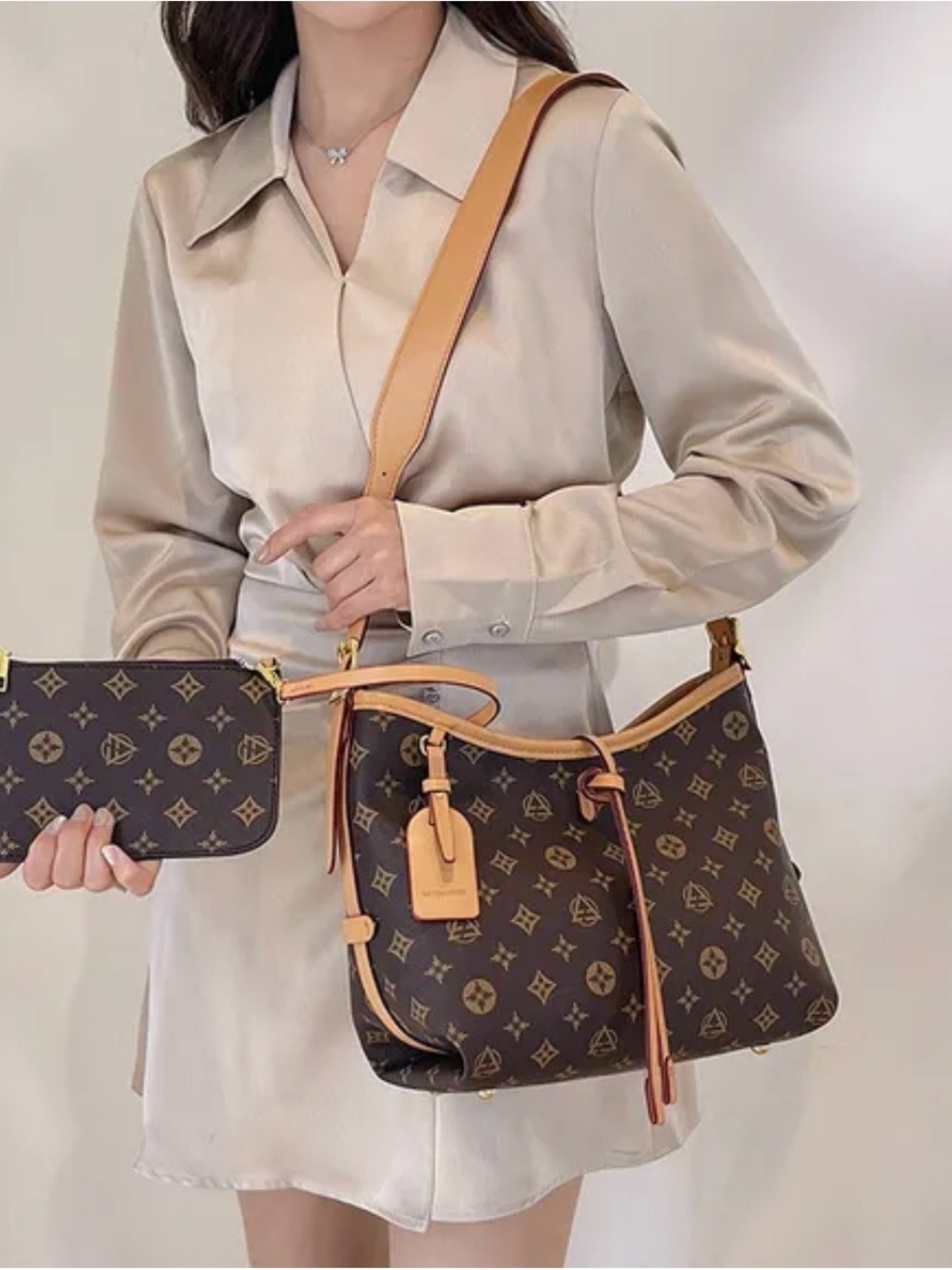 Monogram shoulder bag with pouch